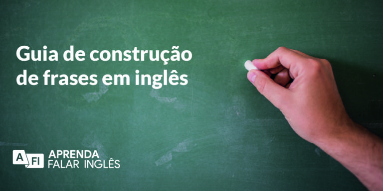 Guia de construção de frases em inglês - uma mão escrevendo em uma lousa